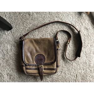 Duluth Pack all leather worn brown bag